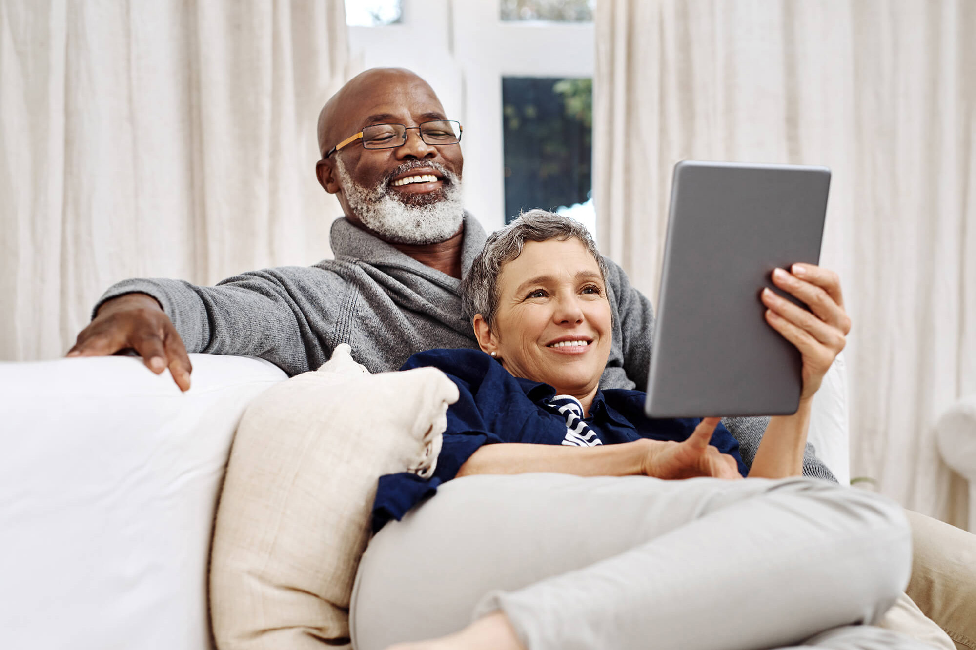 Senior couple in couch together